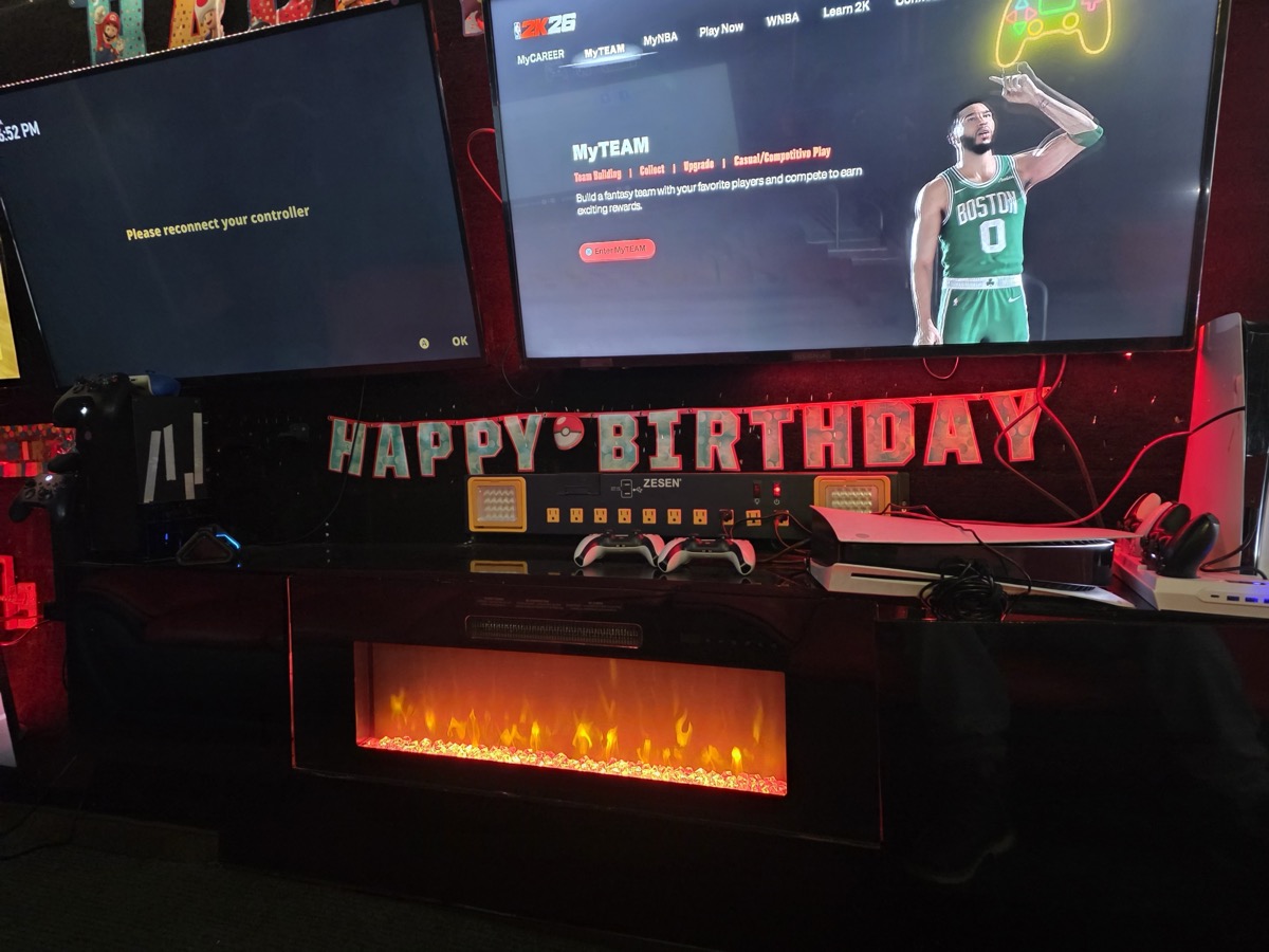 Inside Party Game Truck — Happy Birthday banner with NBA 2K on screen