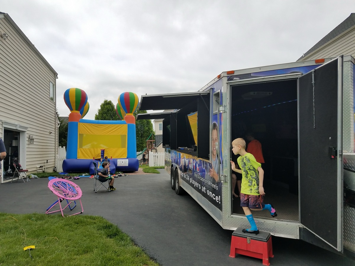 Party Game Truck and bounce house at birthday party